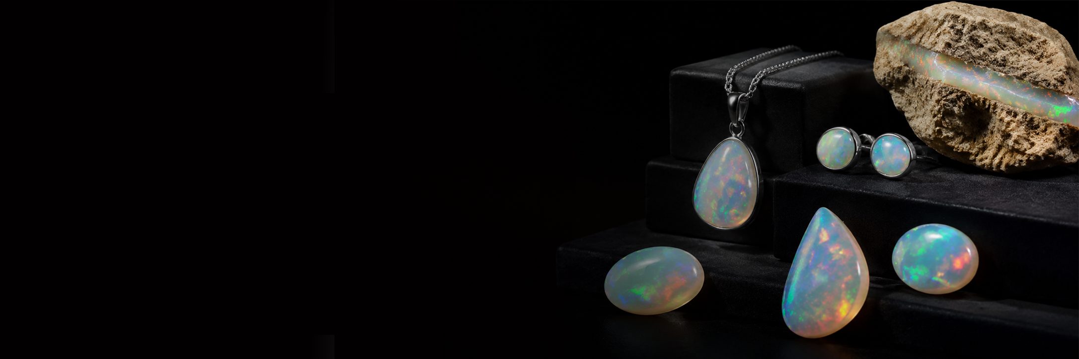 Opal jewellery and rough opal specimens on display in Coober Pedy